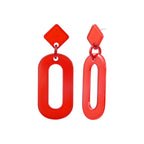 Oval red acetate steel earrings