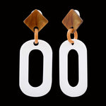 Boucles d'oreilles acétate acier ambre blanc